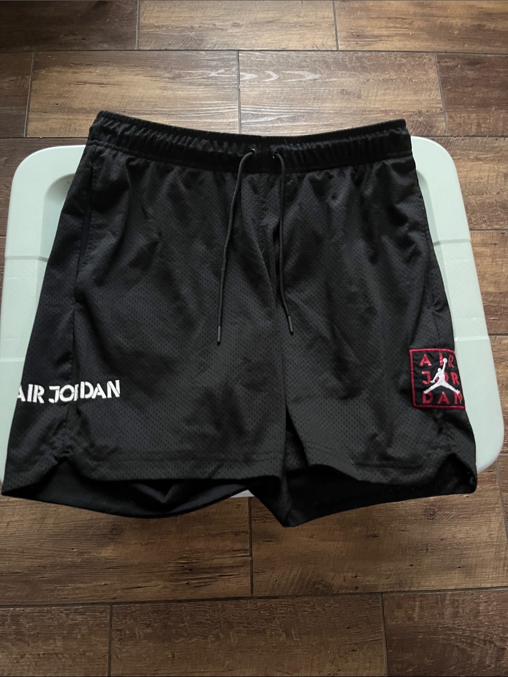 Jordan Men’s Black Athletic Mesh Shorts with Red Accent Patch